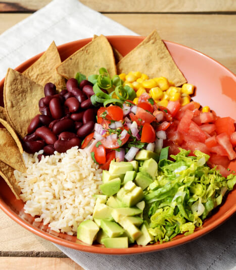 Image of chips and Mexican food in a bowl